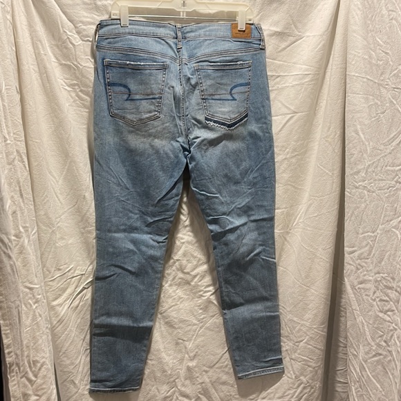 Size 14 stone wash super stretch jeans ripped at the knees - Picture 2 of 2